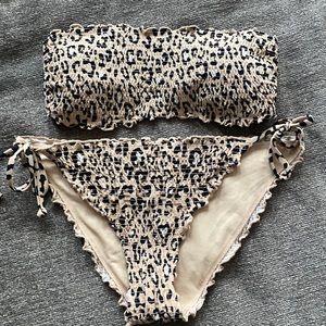 Hollister swim bikini. Top size Small. Bottoms Size Medium. Leopard print